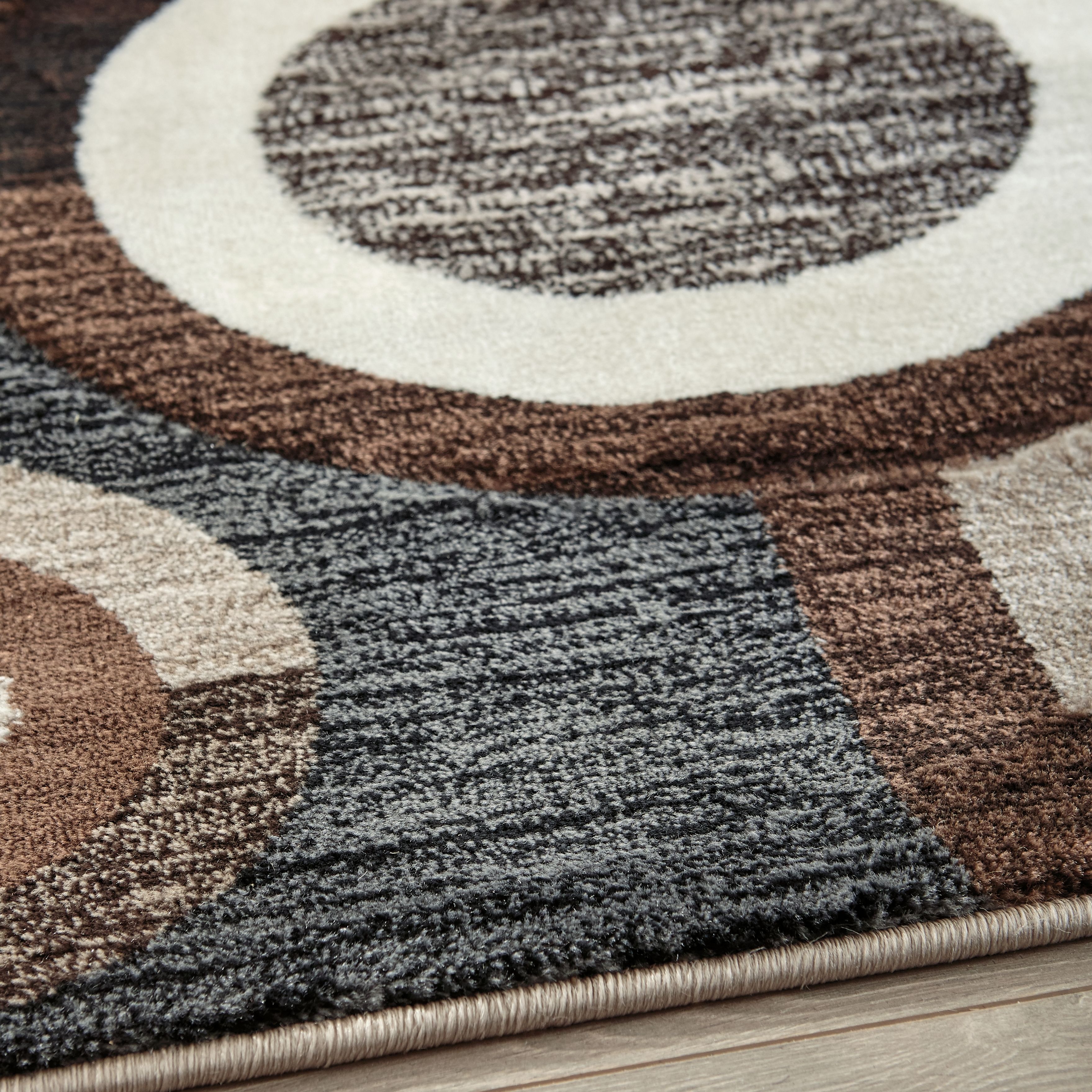 Guintte - 5' x 7' Rug - Brown