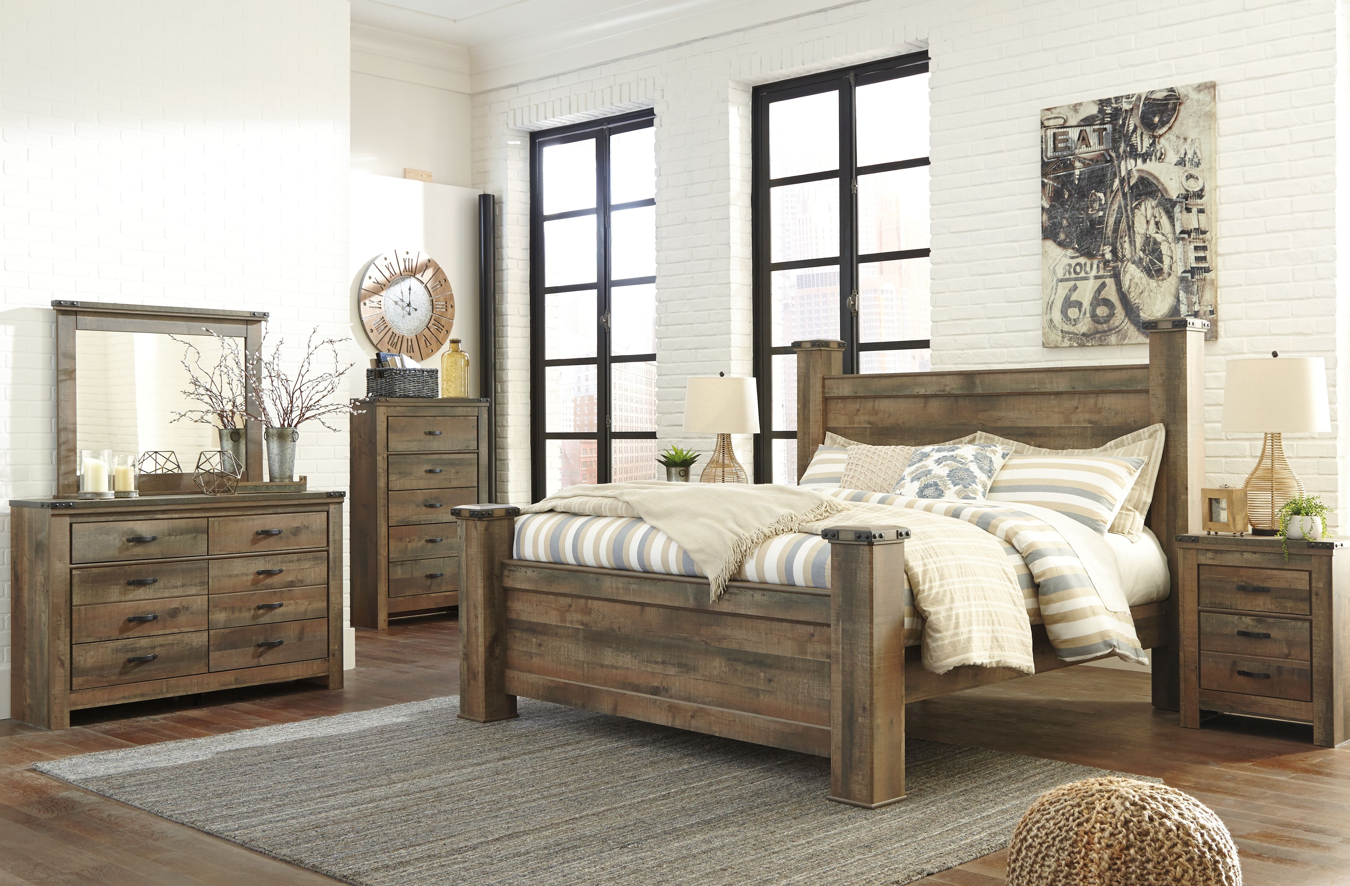 Trinell - King Poster Bed - Brown