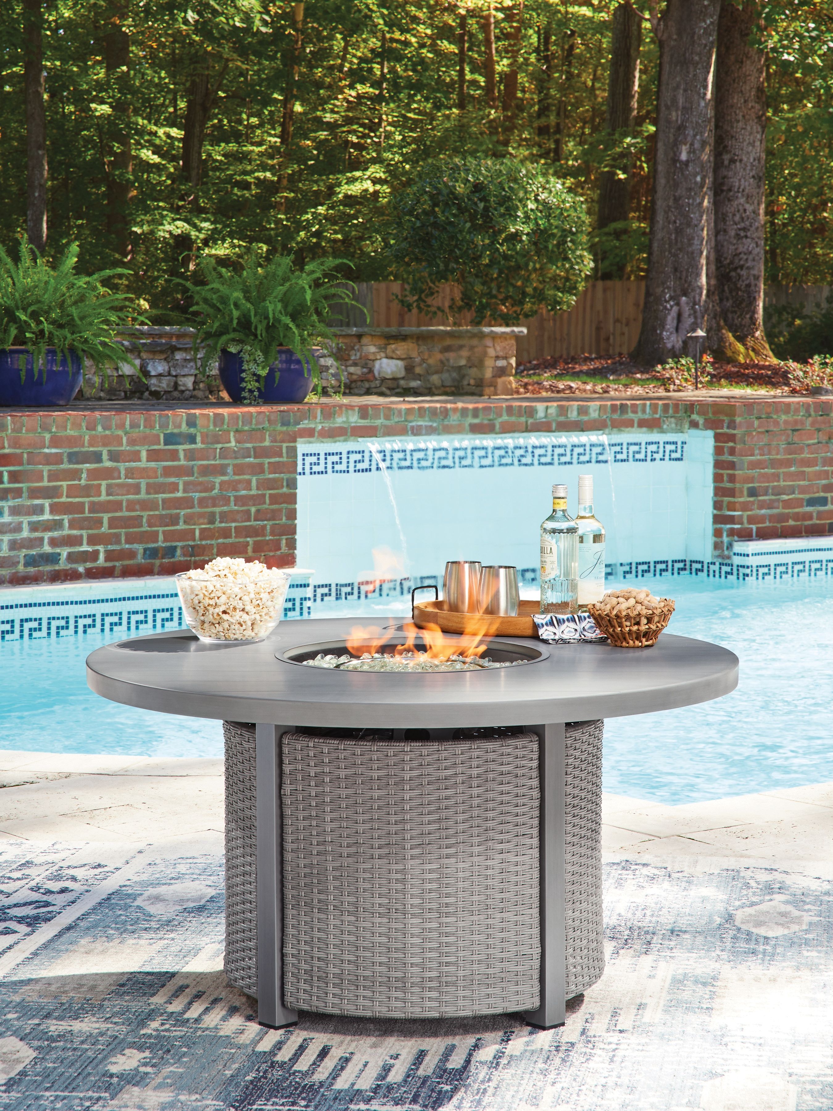 Ashley Furniture Half Moon Beach - Round Fire Pit Table - Gray - Image 2