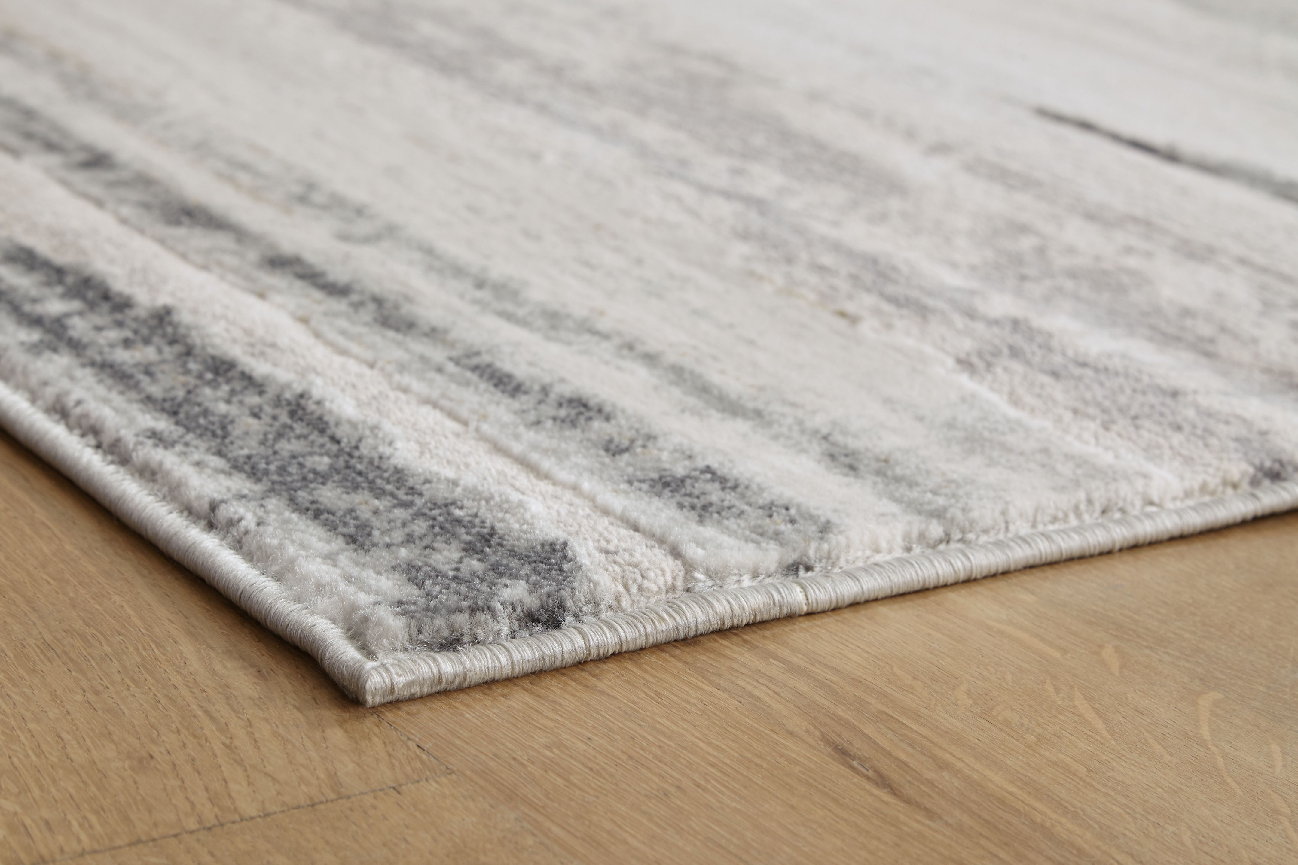 Abanett - 8' x 10' Rug - Gray