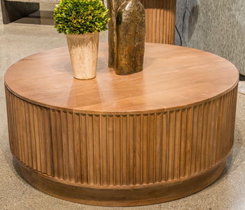 Towner Grove – Round Cocktail Table – Natural Brown