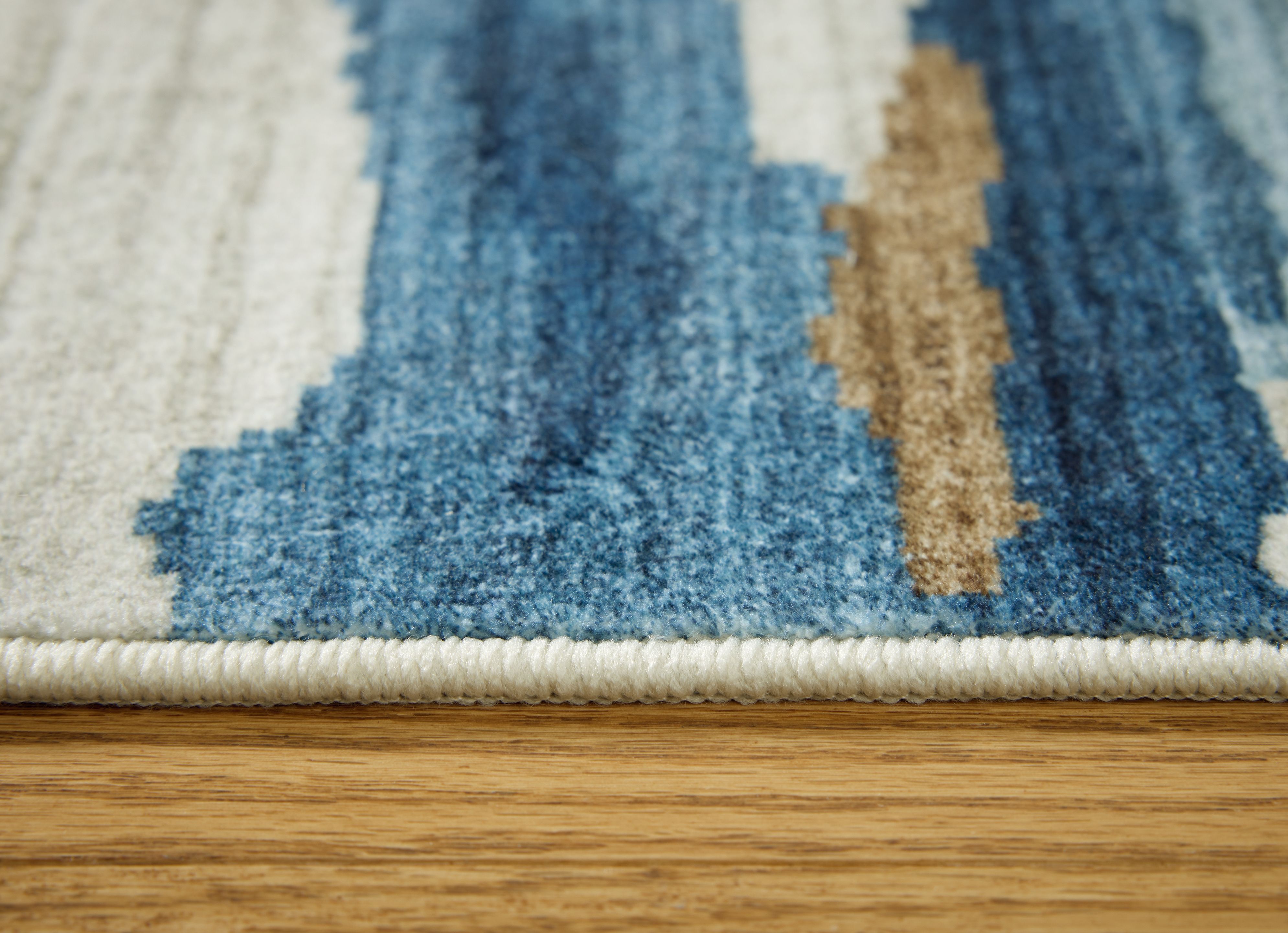 Vinlett - 8' x 10' Washable Rug - Cream / Blue / Brown