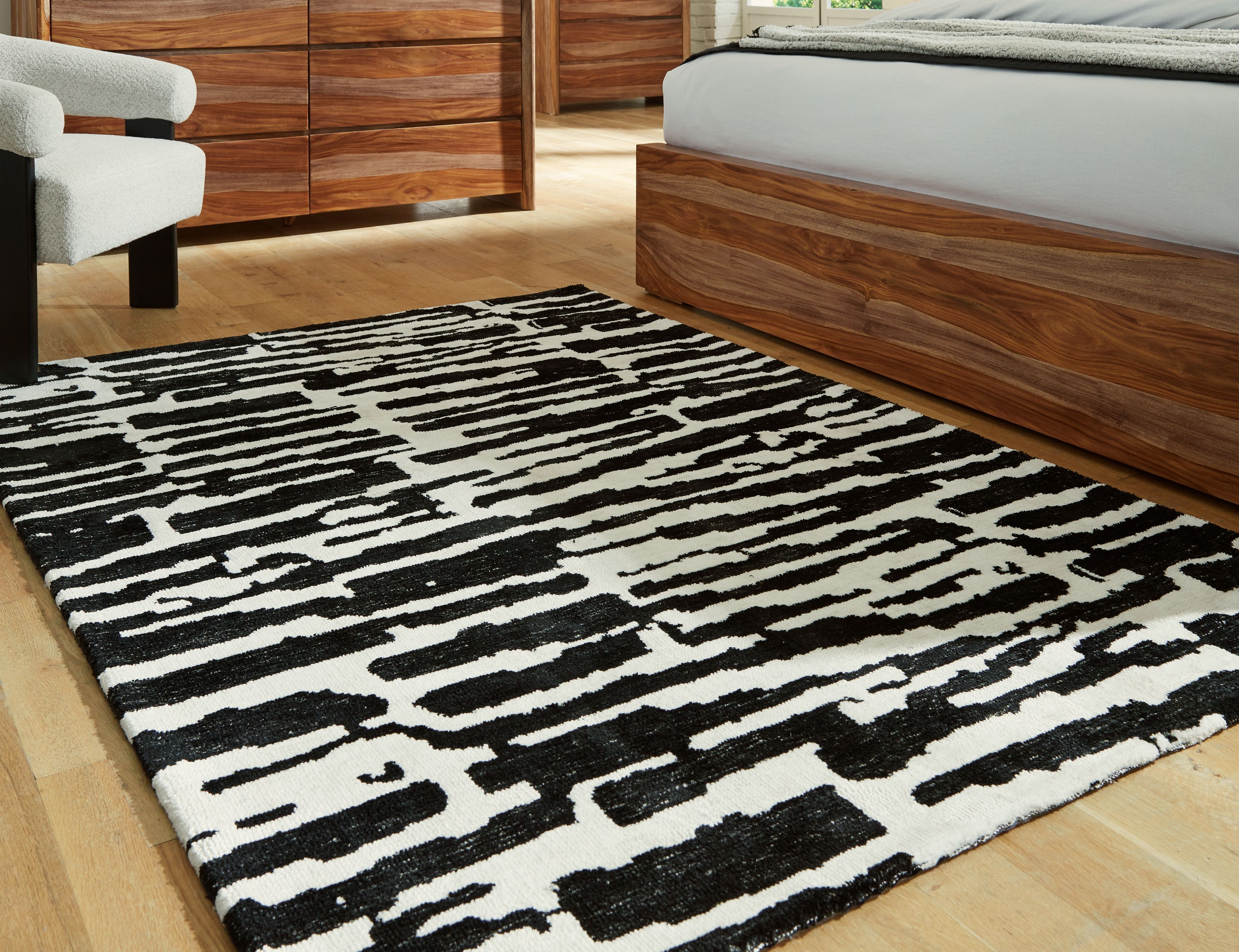Ashley Furniture Bramshaw - 5' x 7' Rug - Black / Ivory - Image 4