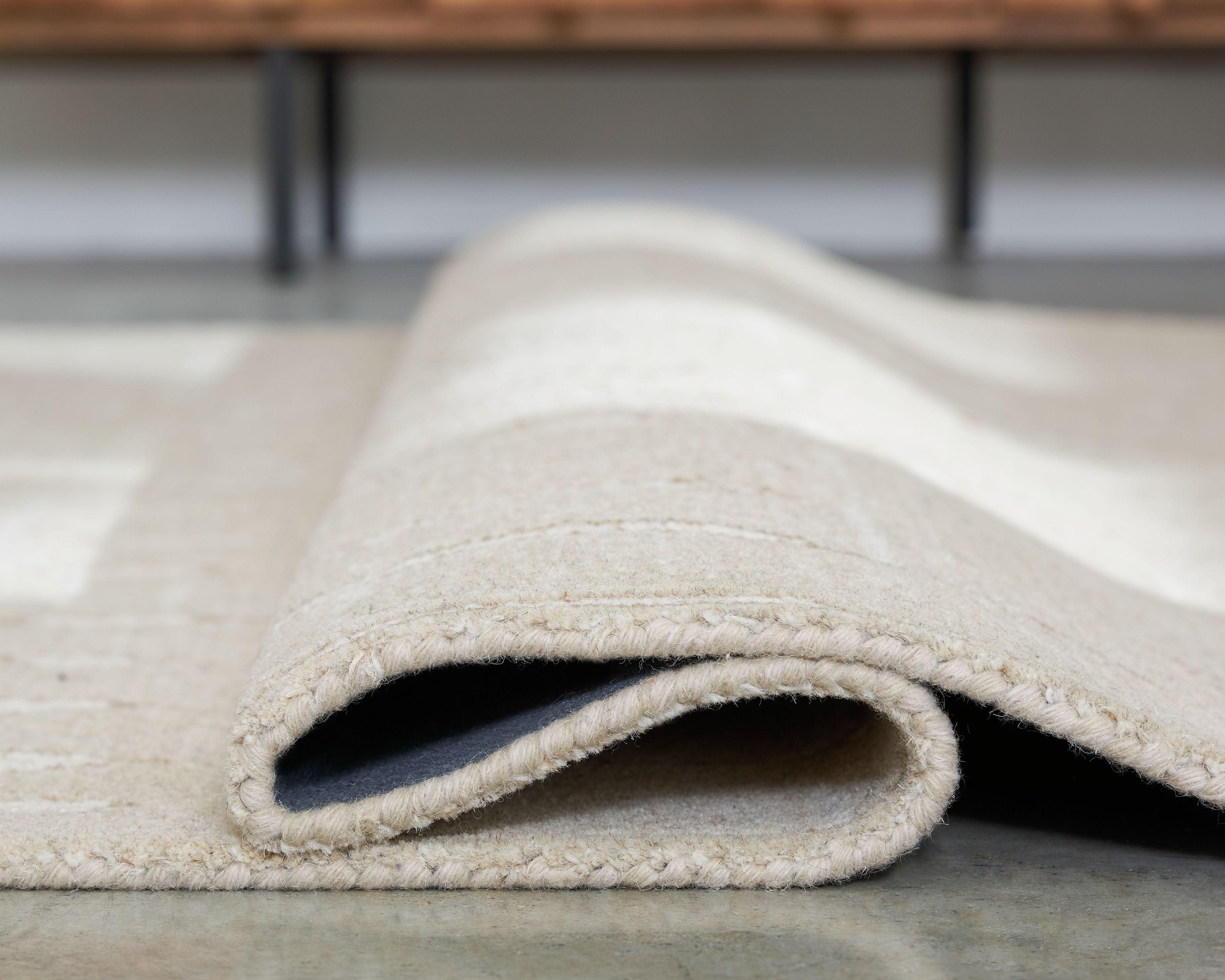 Wolbert - 5' x 7' Rug - Tan / Ivory