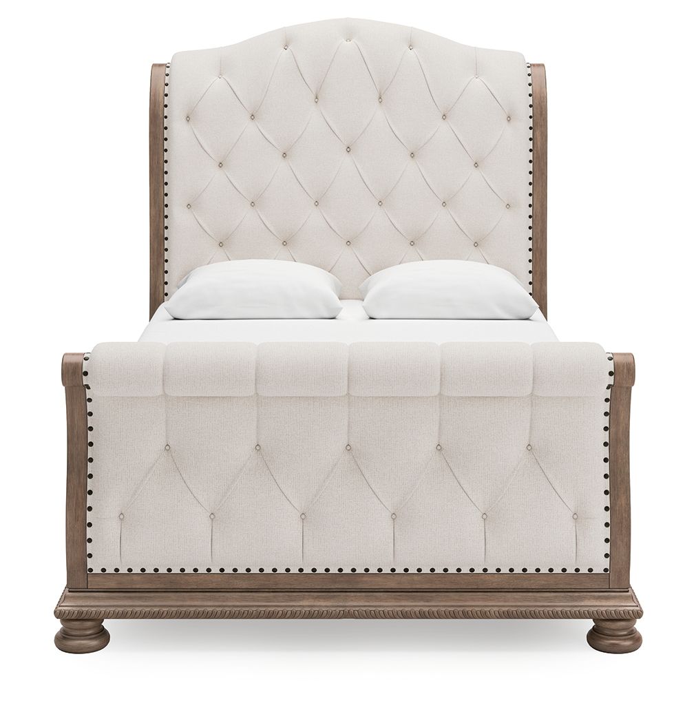 Ardenfield - Queen Upholstered Sleigh Bed - Light Brown