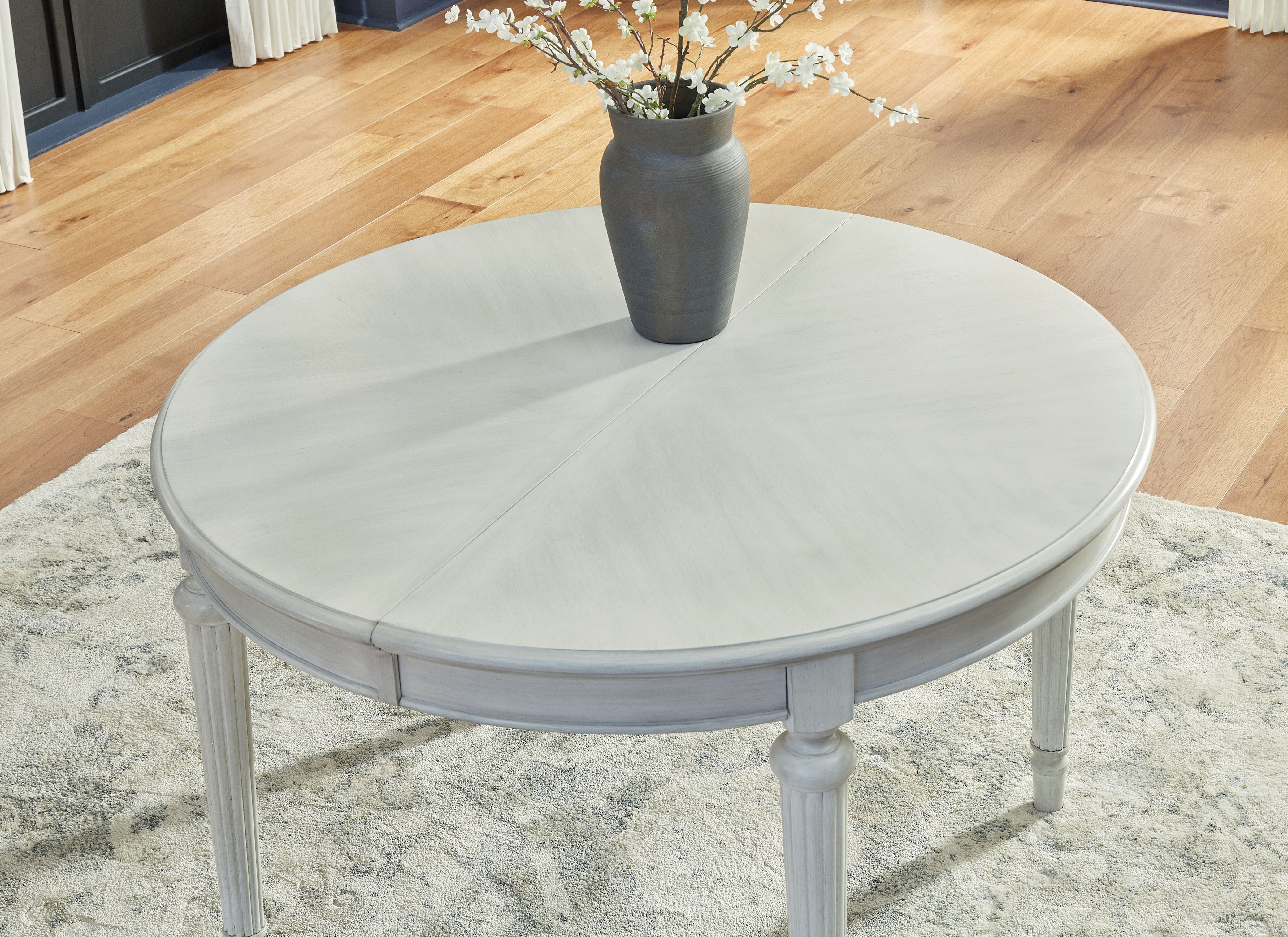 Ashley Furniture Montelaine - Oval Dining Room Extension Table - Antique White - Image 10