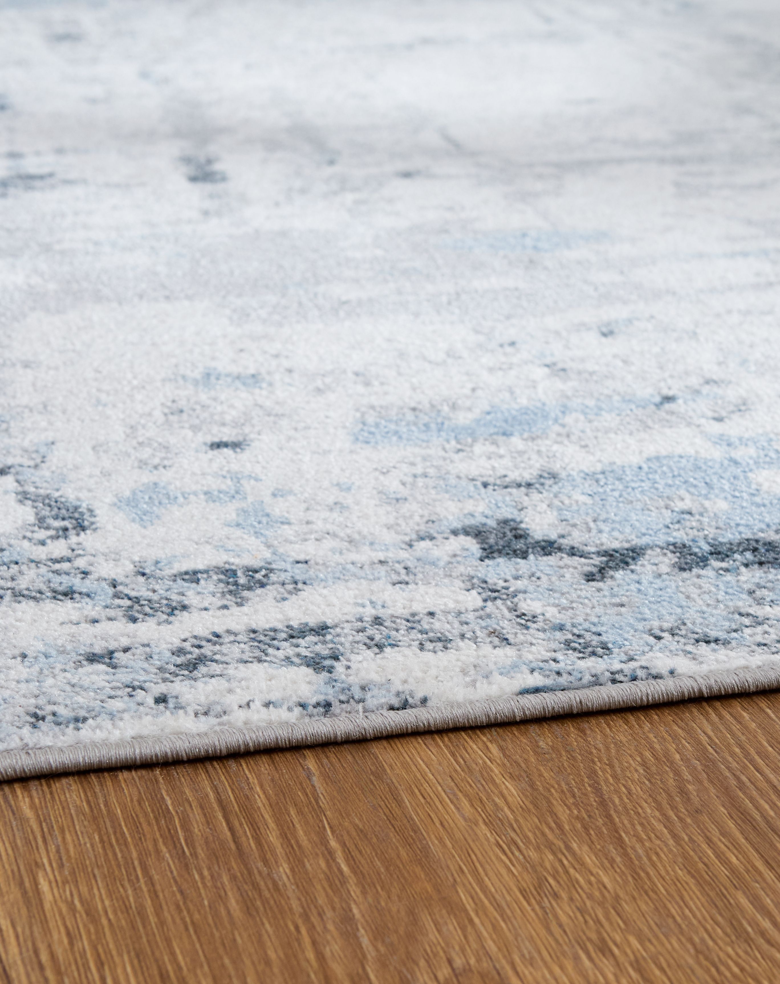 Emertonly - 5' x 7' Washable Rug - Blue / White / Gray