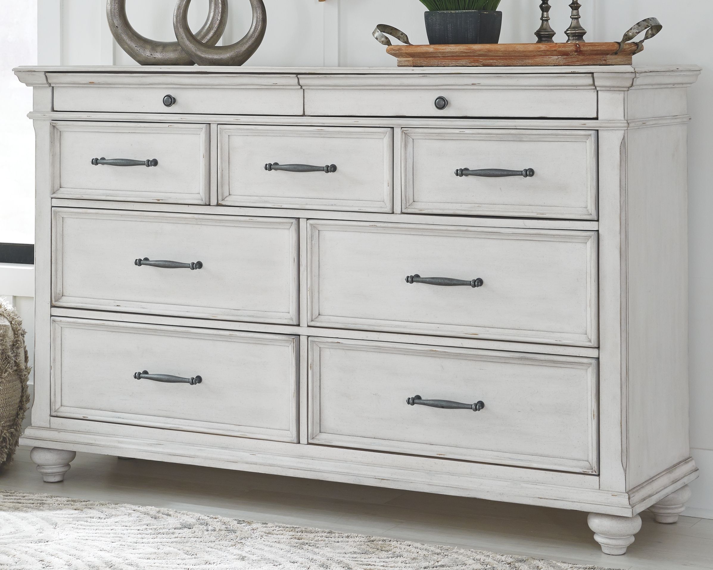 Kanwyn - 8 Pc. - Dresser, Mirror, Chest, King Upholstered Bed with Storage Bench, 2 Nightstands - Whitewash