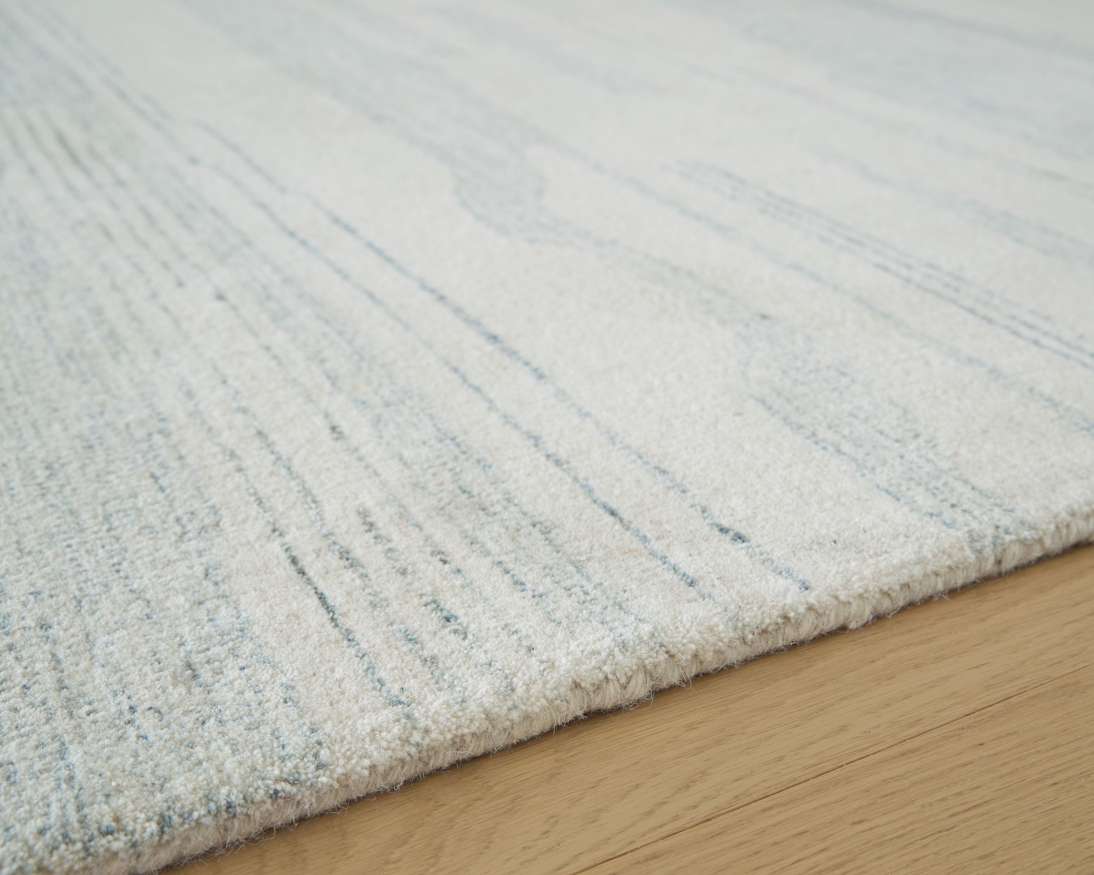 Genemost - 5' x 7' Rug - Ivory / Blue