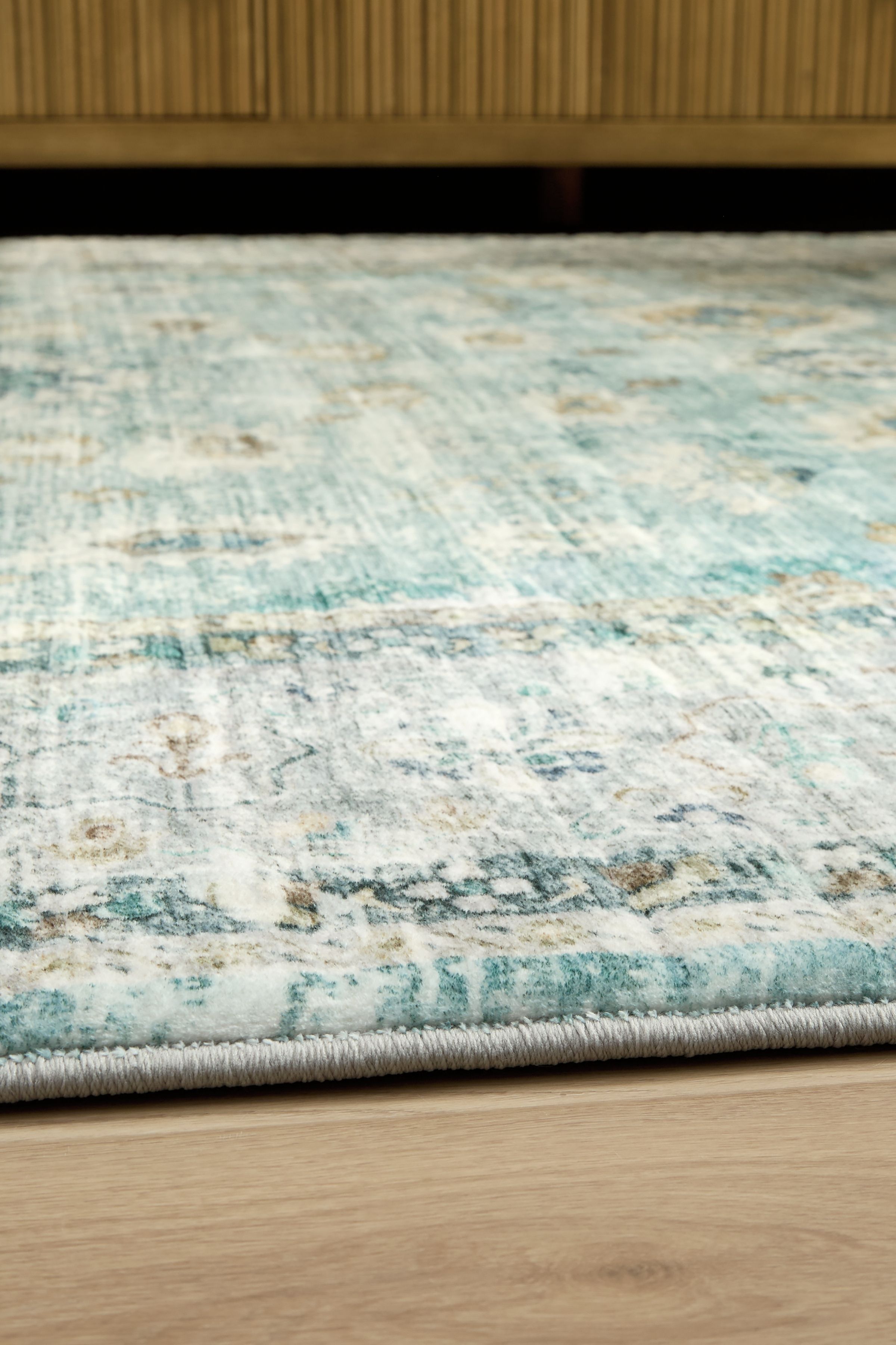 Ladstoney - 5' x 7' Rug - Teal / Beige / Ochre