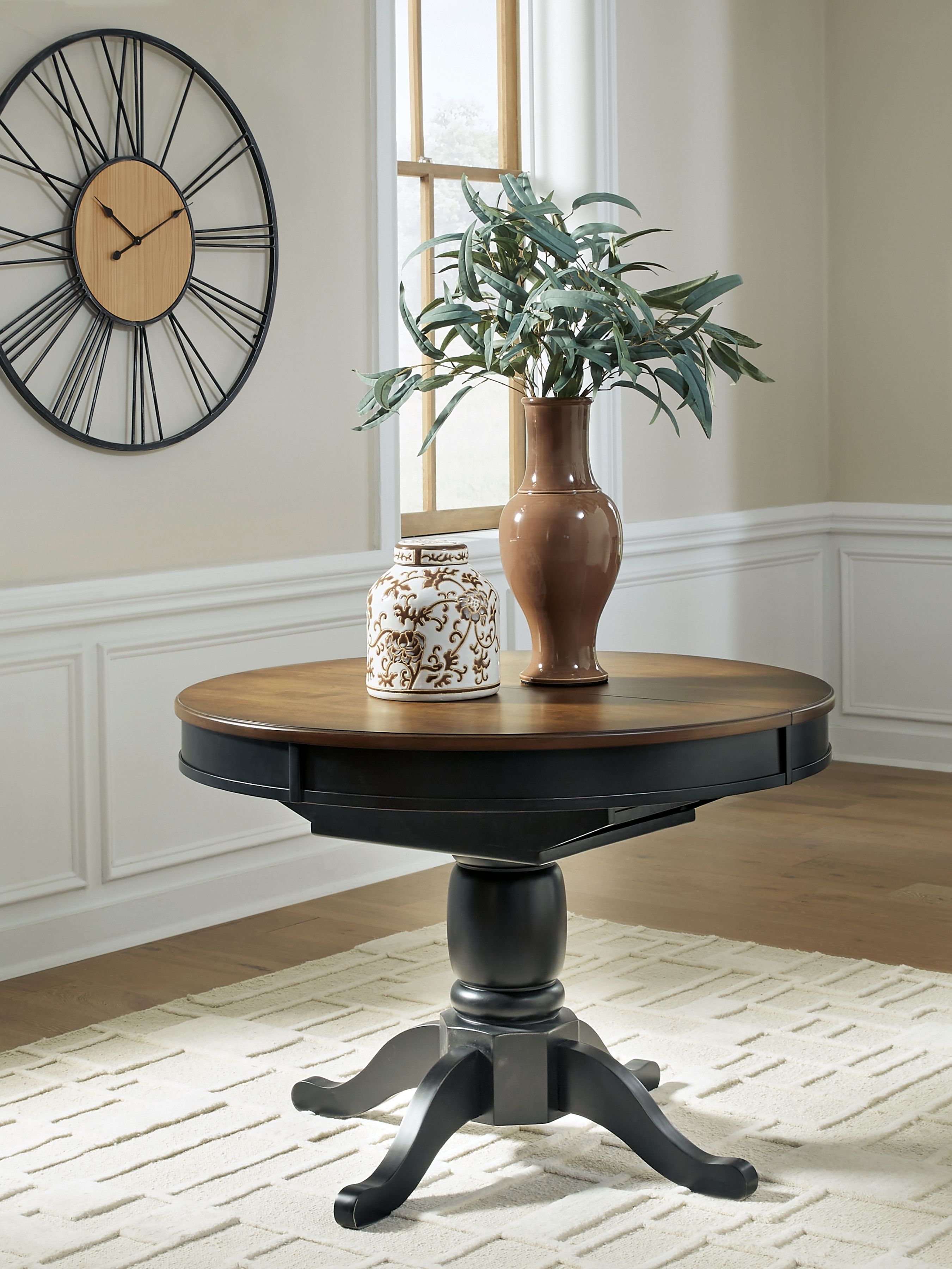 Ashley Furniture Clorazi - Oval Dining Room Butterfly Extension Table - Black / Brown - Image 5