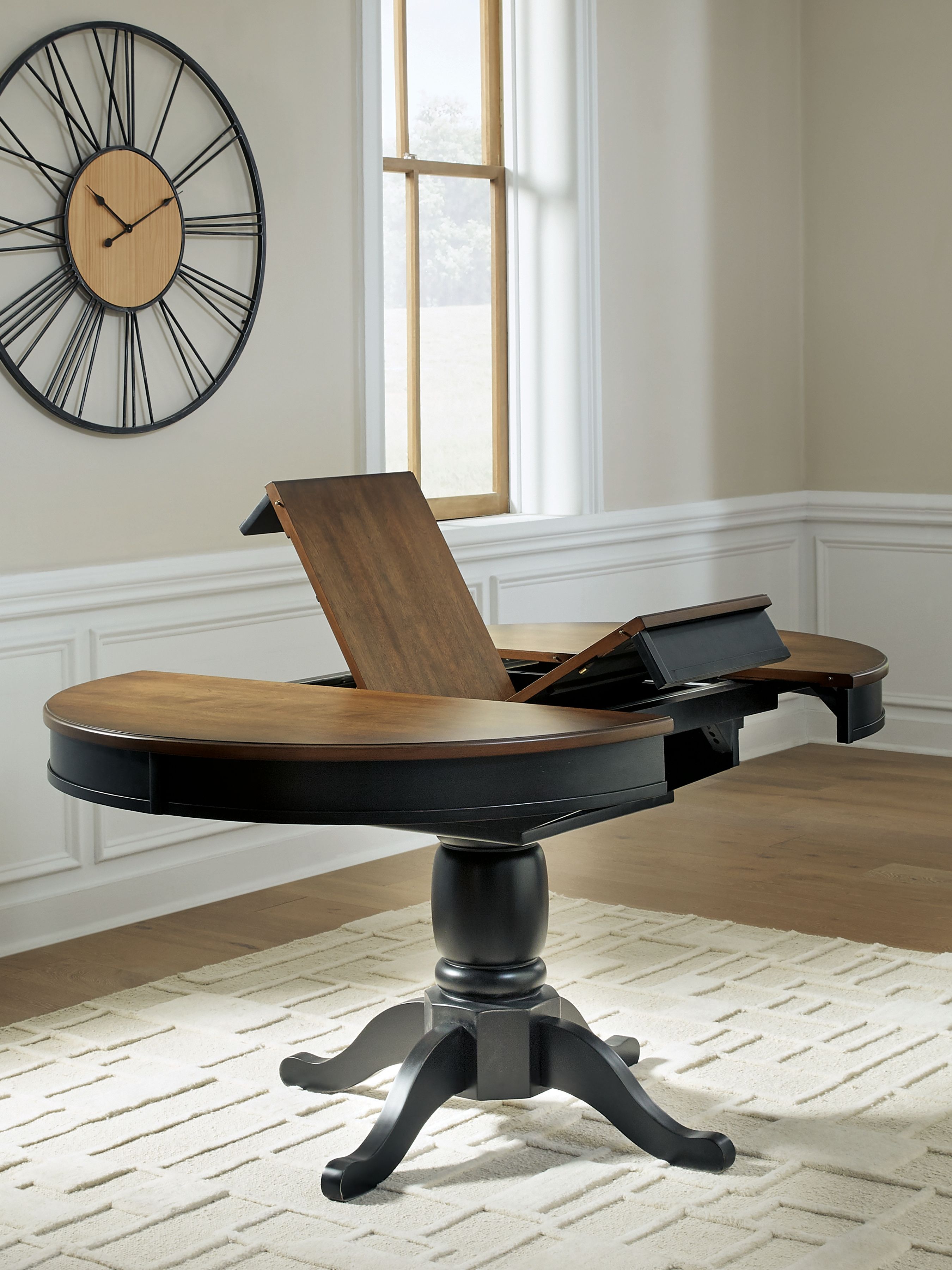 Ashley Furniture Clorazi - Oval Dining Room Butterfly Extension Table - Black / Brown - Image 6
