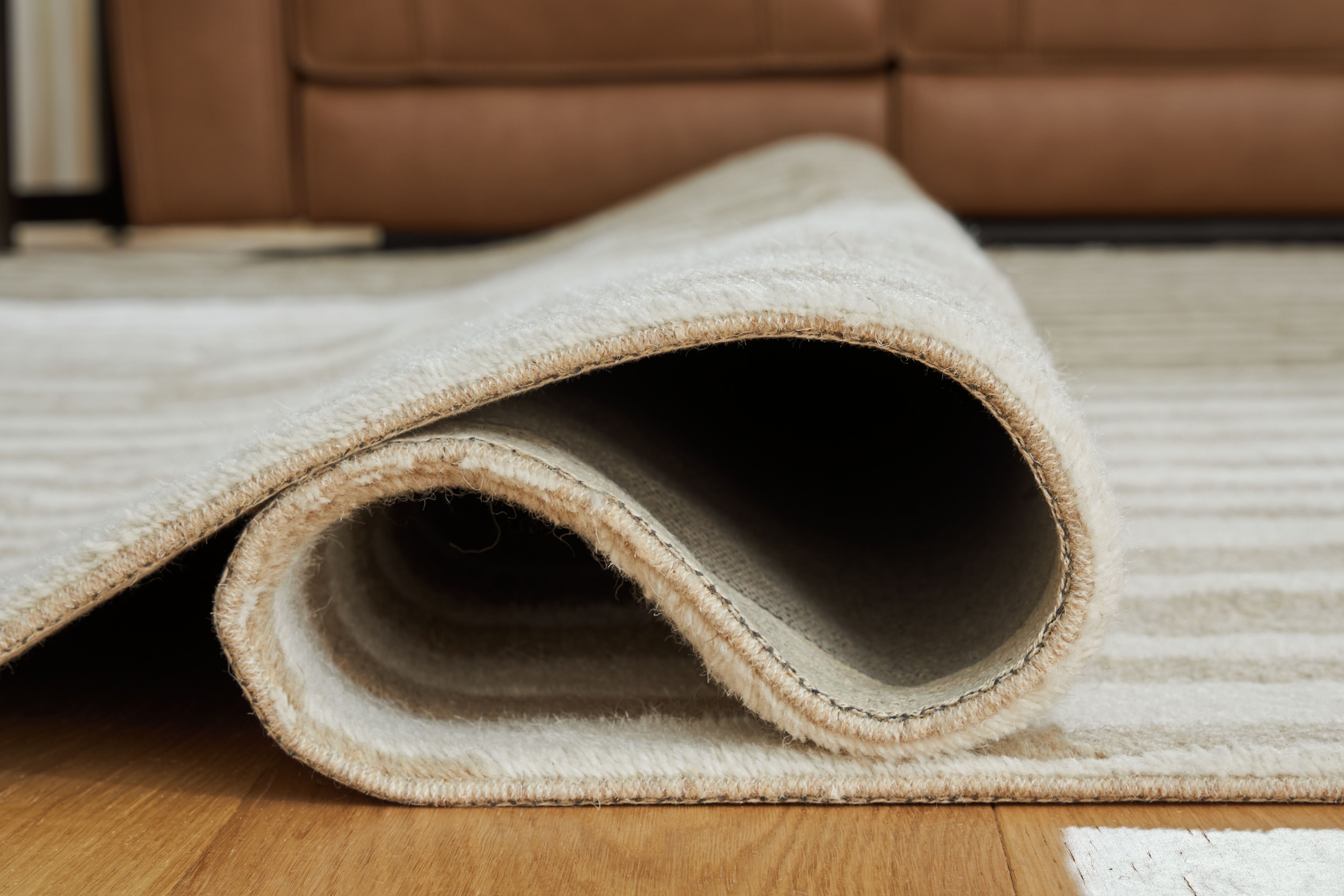 Corrbell - 5' x 7' Rug - Beige / White