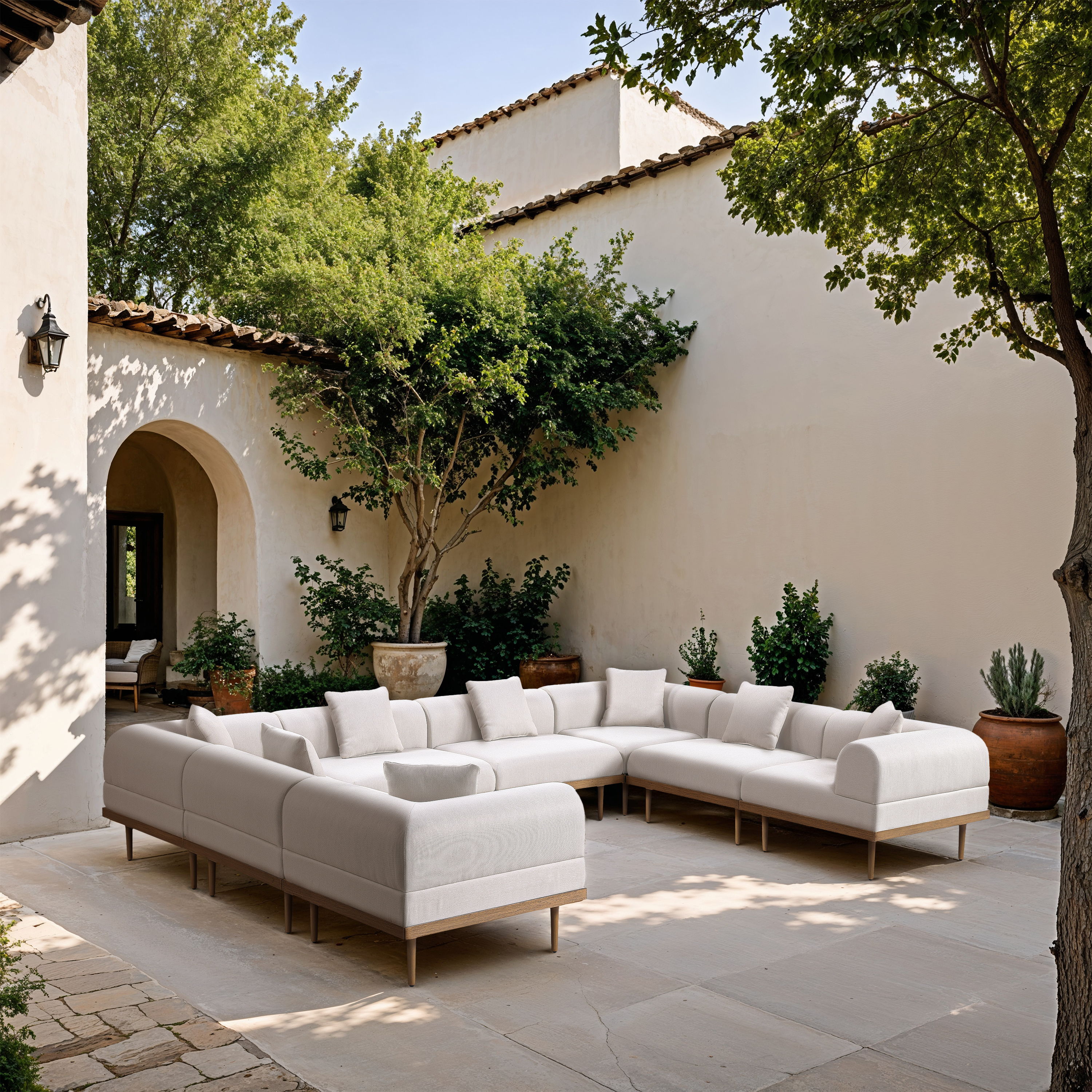 Laguna - 8 Piece Resilient Water Resistant Fabric 142" Upholstered Outdoor Patio Modular Sectional - Cream