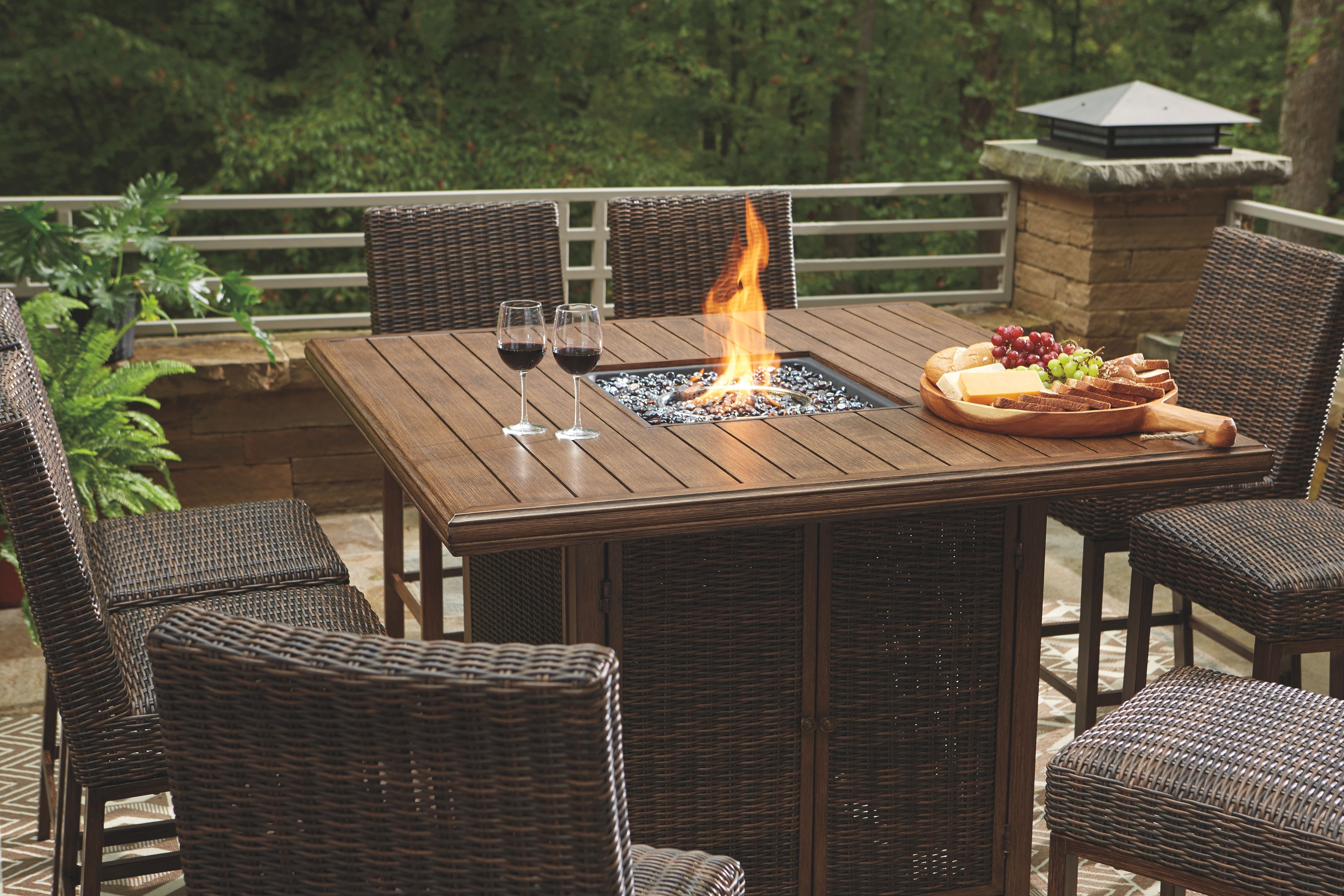 Paradise Trail - 7 Pc. - Fire Pit Table, 6 Barstools - Medium Brown