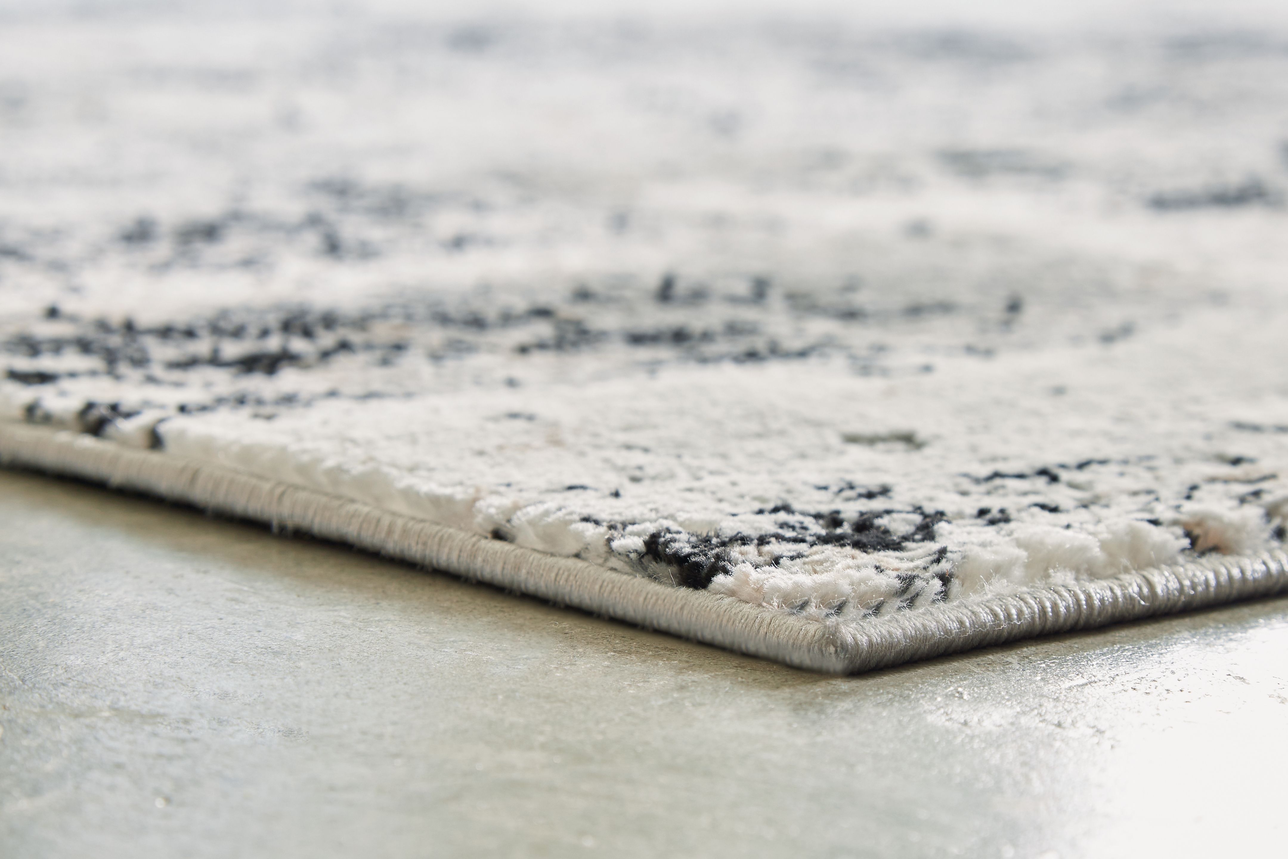 Langwell - 10' x 14' Rug - Black / Gray / White