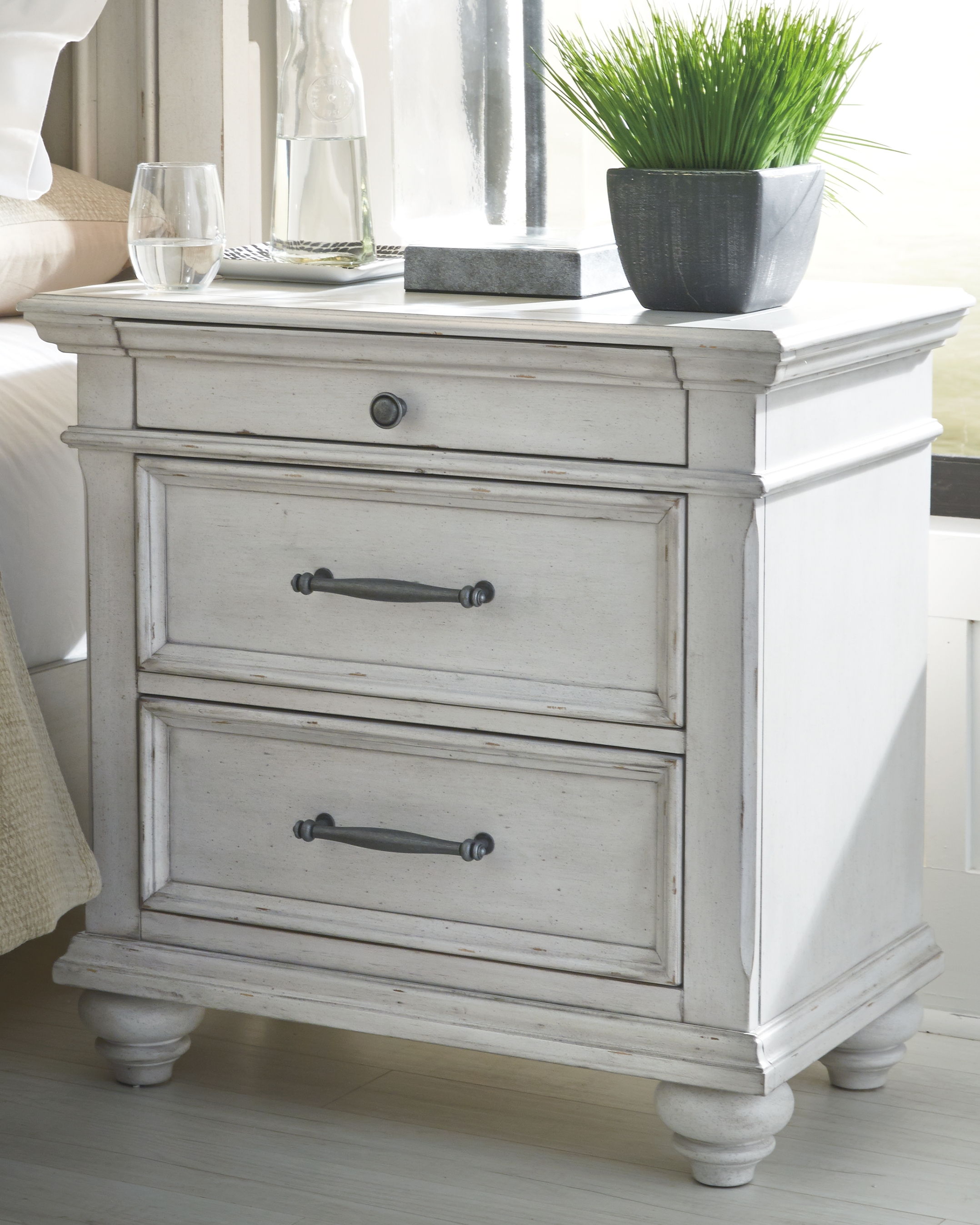 Ashley Furniture Kanwyn - 8 Pc. - Dresser, Mirror, Chest, King Upholstered Panel Bed, 2 Nightstands - Whitewash - Image 5