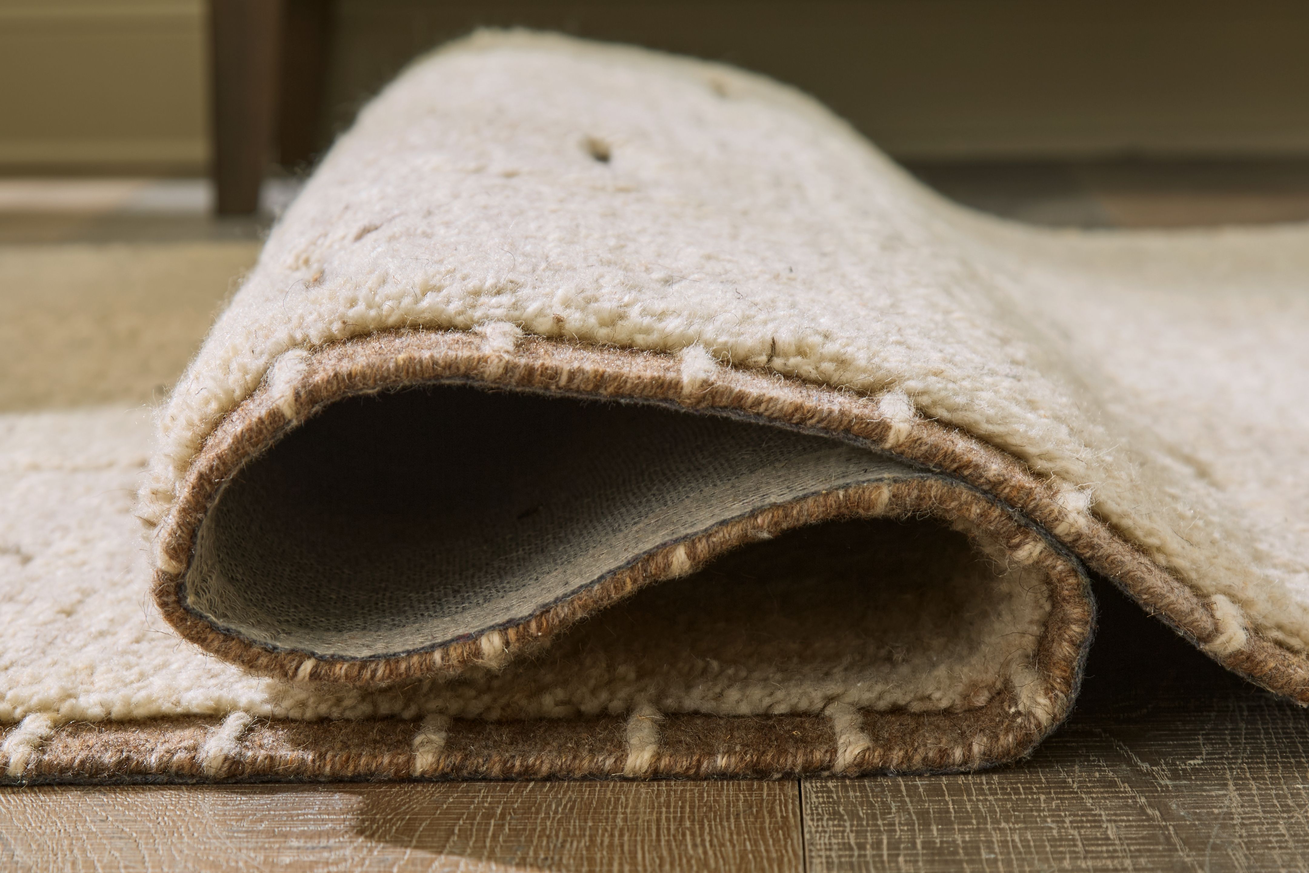 Clayman - 5' x 7' Rug - Beige / Brown