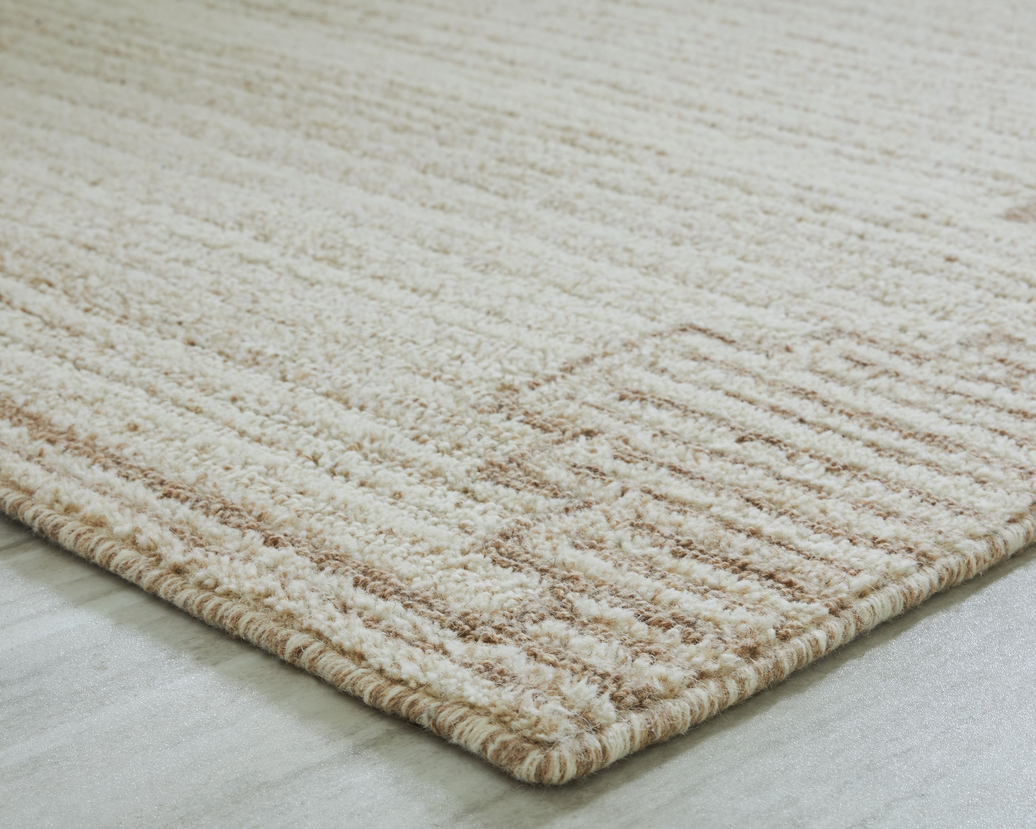 Emorymore - 10' x 14' Rug - Brown / Beige
