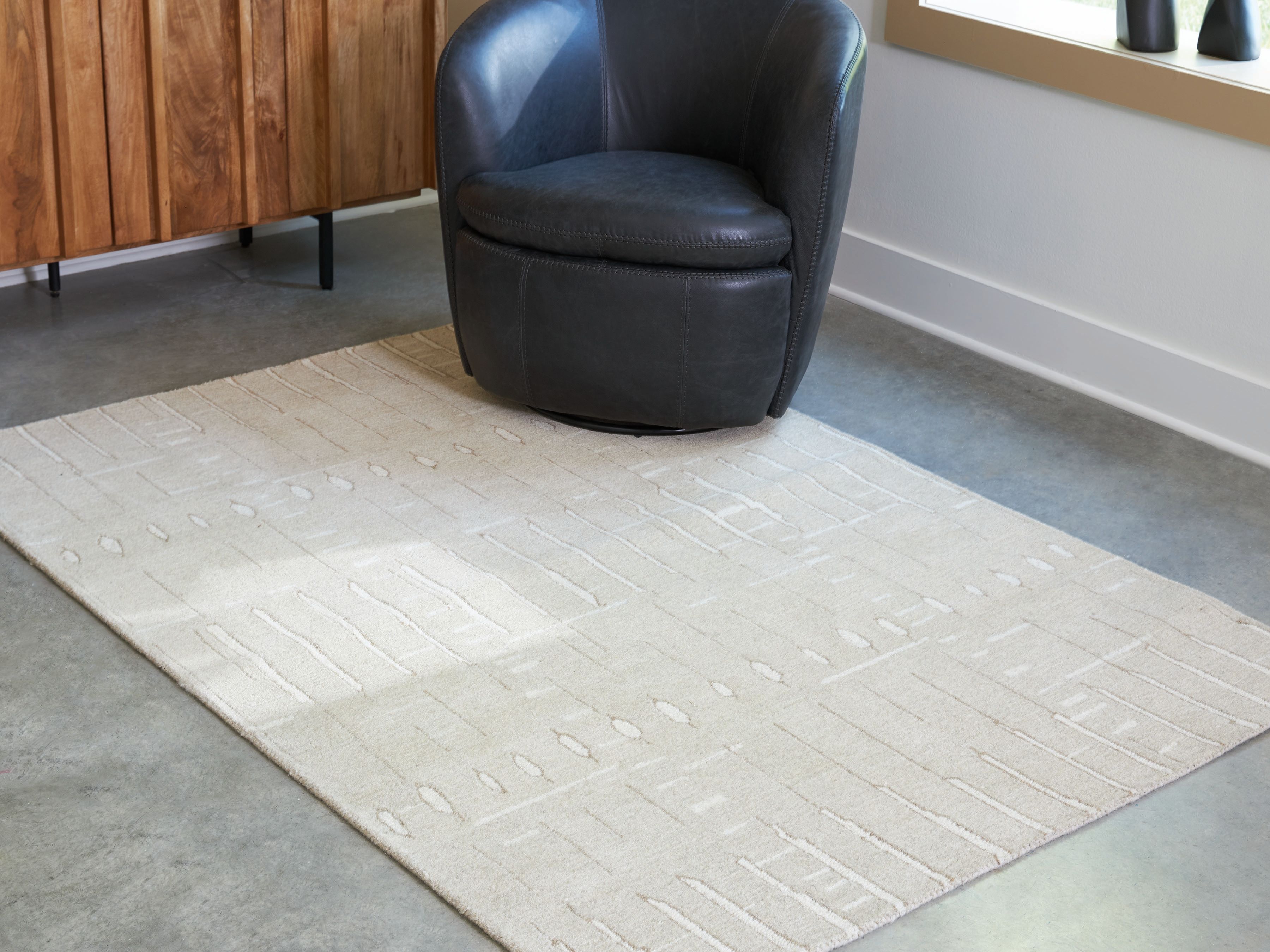 Ashley Furniture Wolbert - 5' x 7' Rug - Tan / Ivory - Image 2